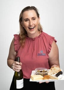 Nicole Farrell tax franchisee support with cheese and wine