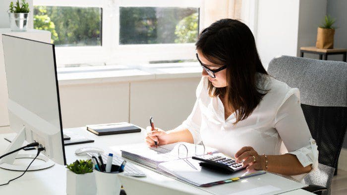 woman accountant working on financial transactions and accounts