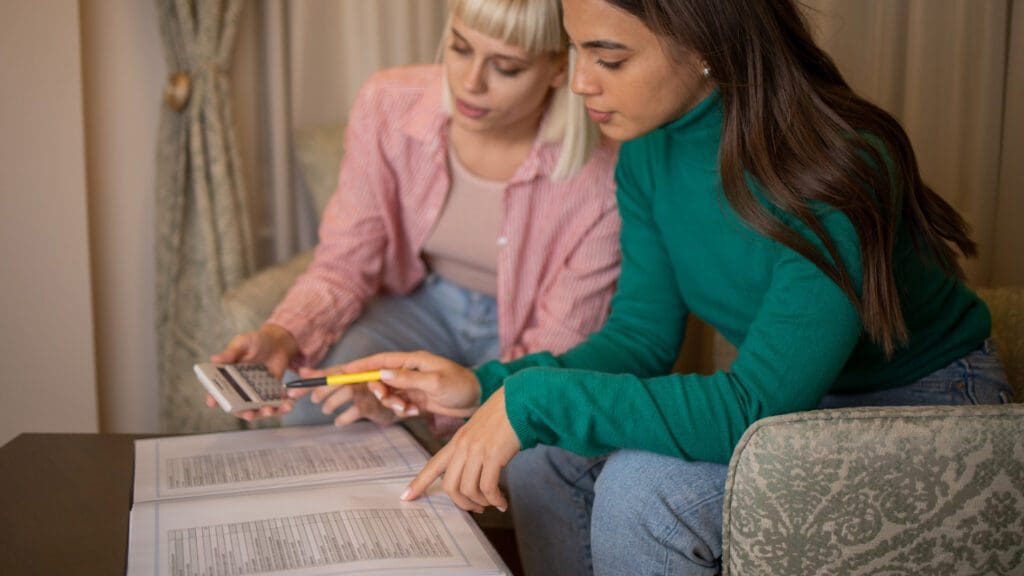 Two women discussing finances