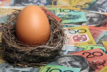 Nest egg on Australian money, symbolising superannuation savings and tax implications.